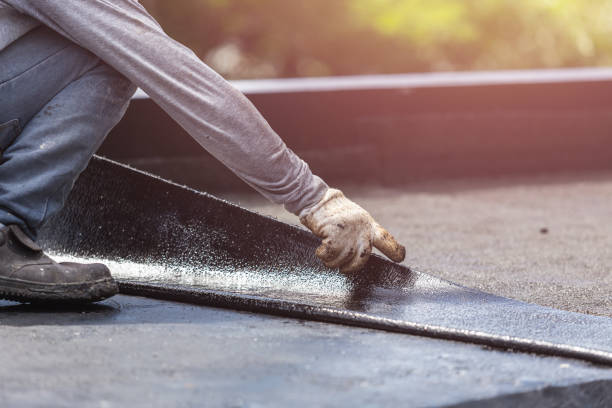 Professional Basement Waterproofing technician working in Hume, VA